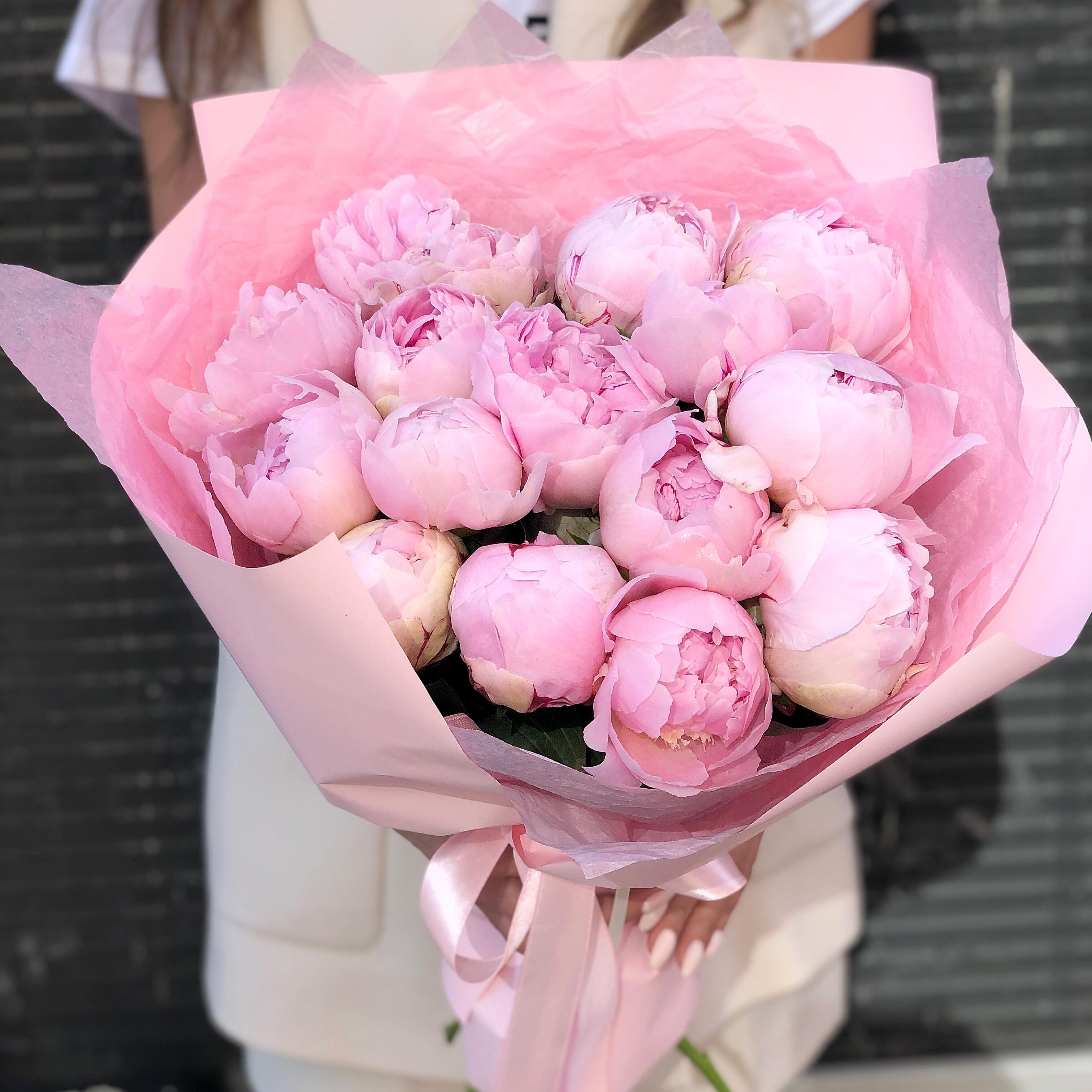 The charm of a bouquet of soft pink peonies