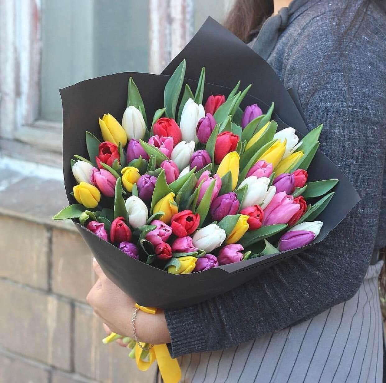 Luxurious bouquet of multi-colored tulips